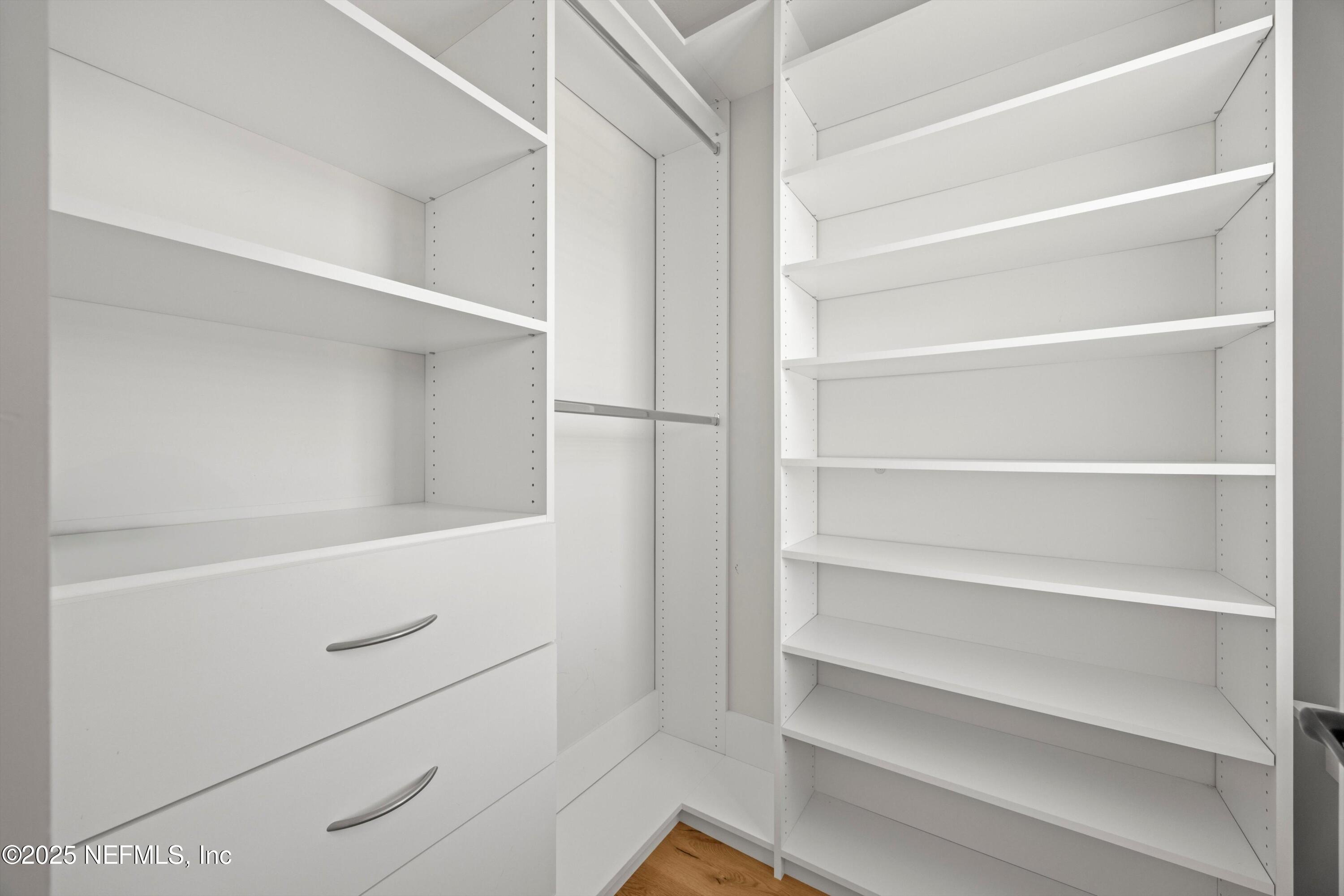 86 Sunset Ridge Court St. Johns, FL 32259 - Photo 52 of 66 a view of walk in closet with empty racks