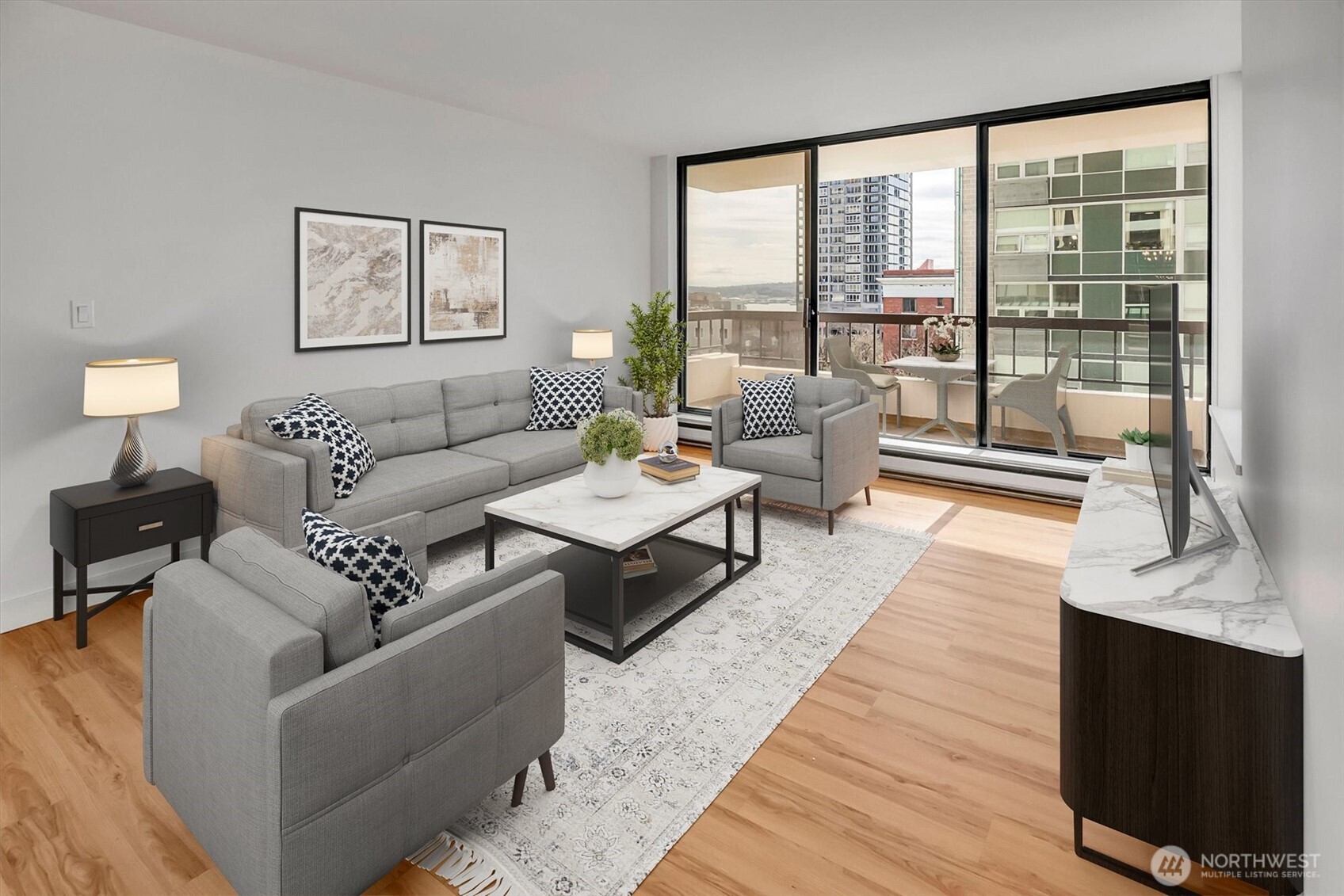 a living room with furniture and a large window