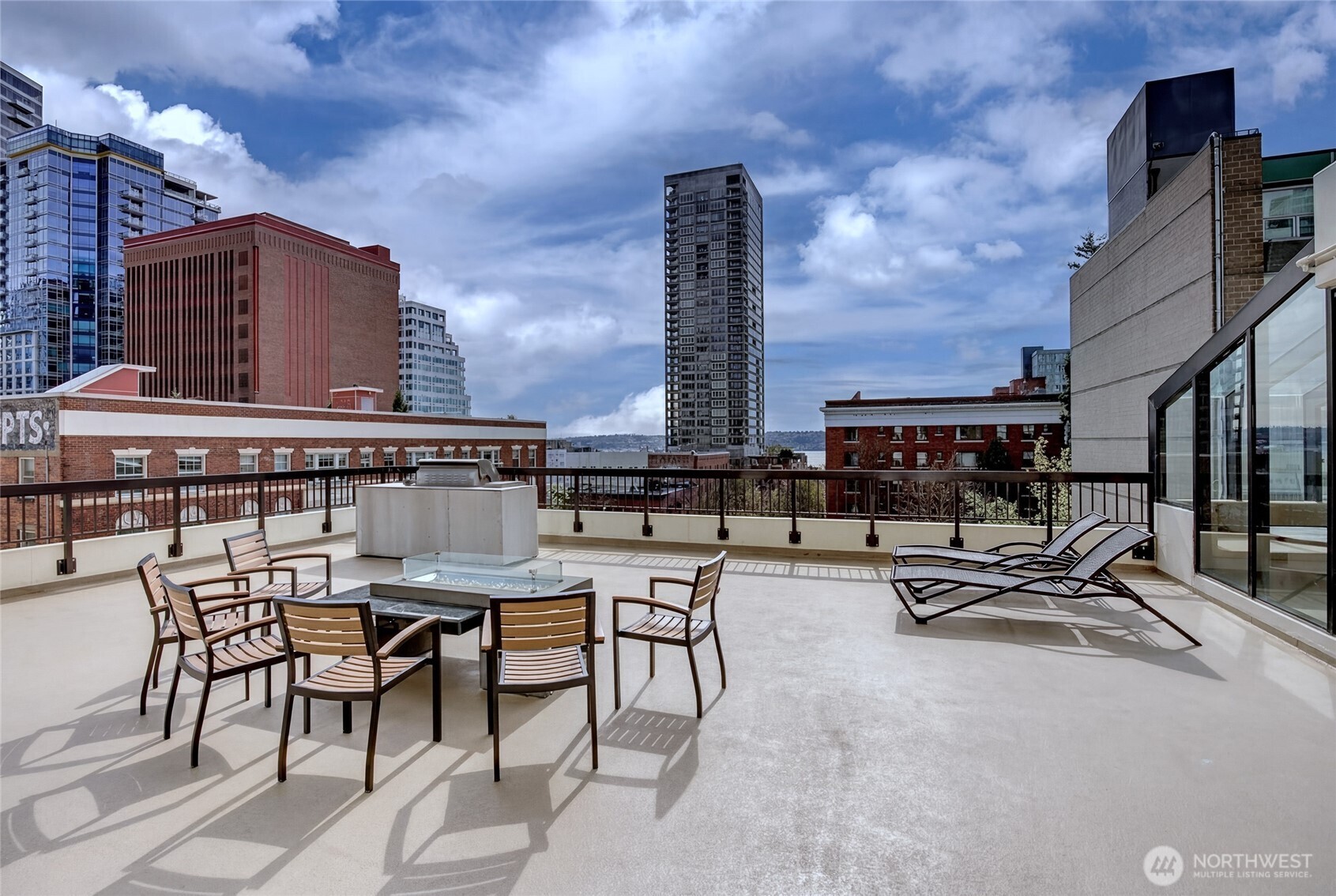 2201 3rd Avenue, Unit 803 Seattle, WA 98121 - Photo 14 of 26 a view of a terrace with sitting area