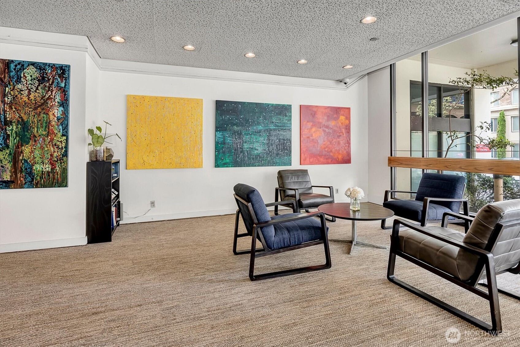 2201 3rd Avenue, Unit 803 Seattle, WA 98121 - Photo 24 of 26 a living room with furniture and a rug