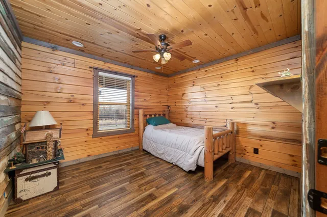 a bathroom with a toilet a sink and shower