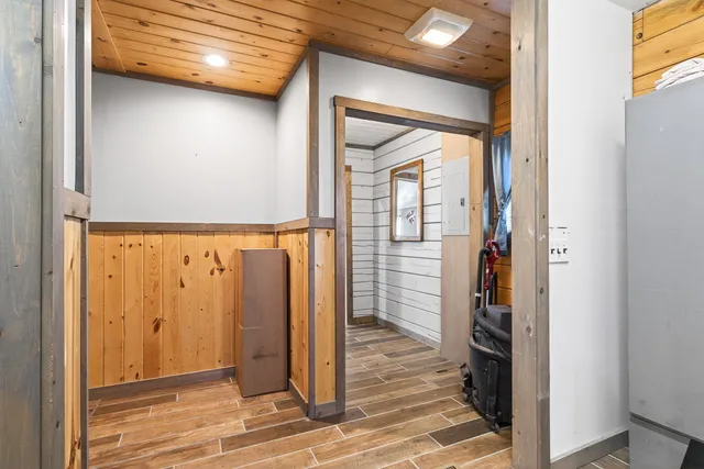 a view of a hallway with washer and dryer