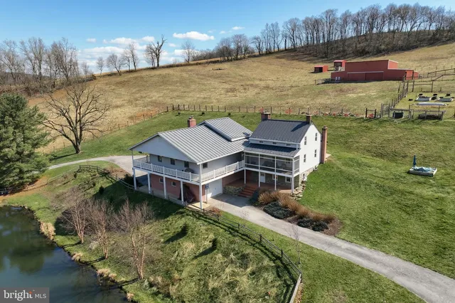 a view of a swimming pool with an ocean view