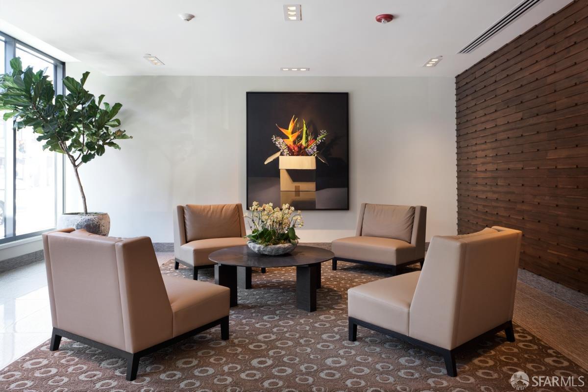 1450 Franklin Street, Unit 701 San Francisco, CA 94109 - Photo 20 of 20 a living room with furniture and a potted plant
