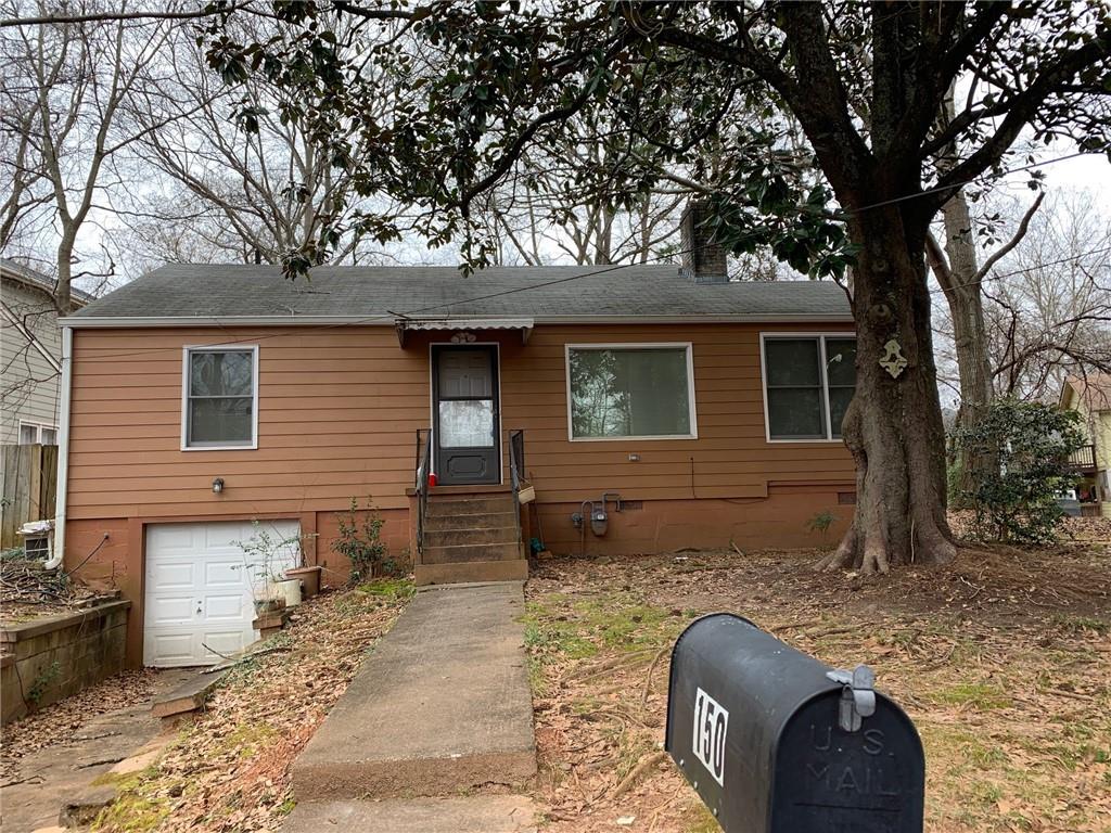 150 Hood Circle Decatur, GA 30030 - Photo 1 of 1 a backyard of a house with seating space