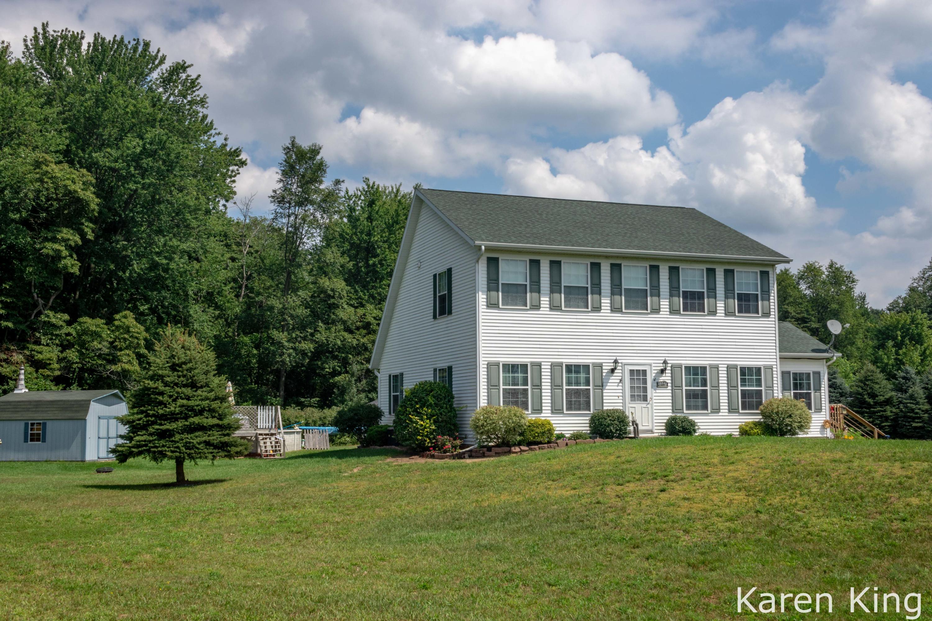3597 Rustic Lane Hamilton, MI 49419 - Photo 1 of 35 Front View - East