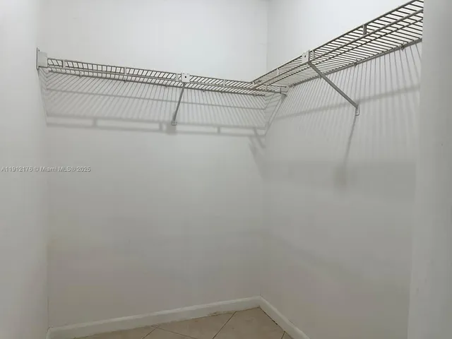 a view of a room with racks on the wall