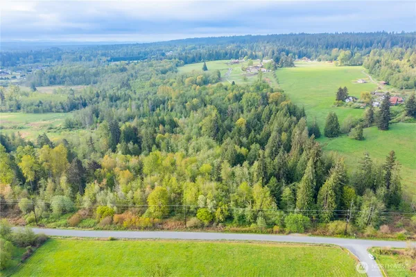 a view of lake with green space