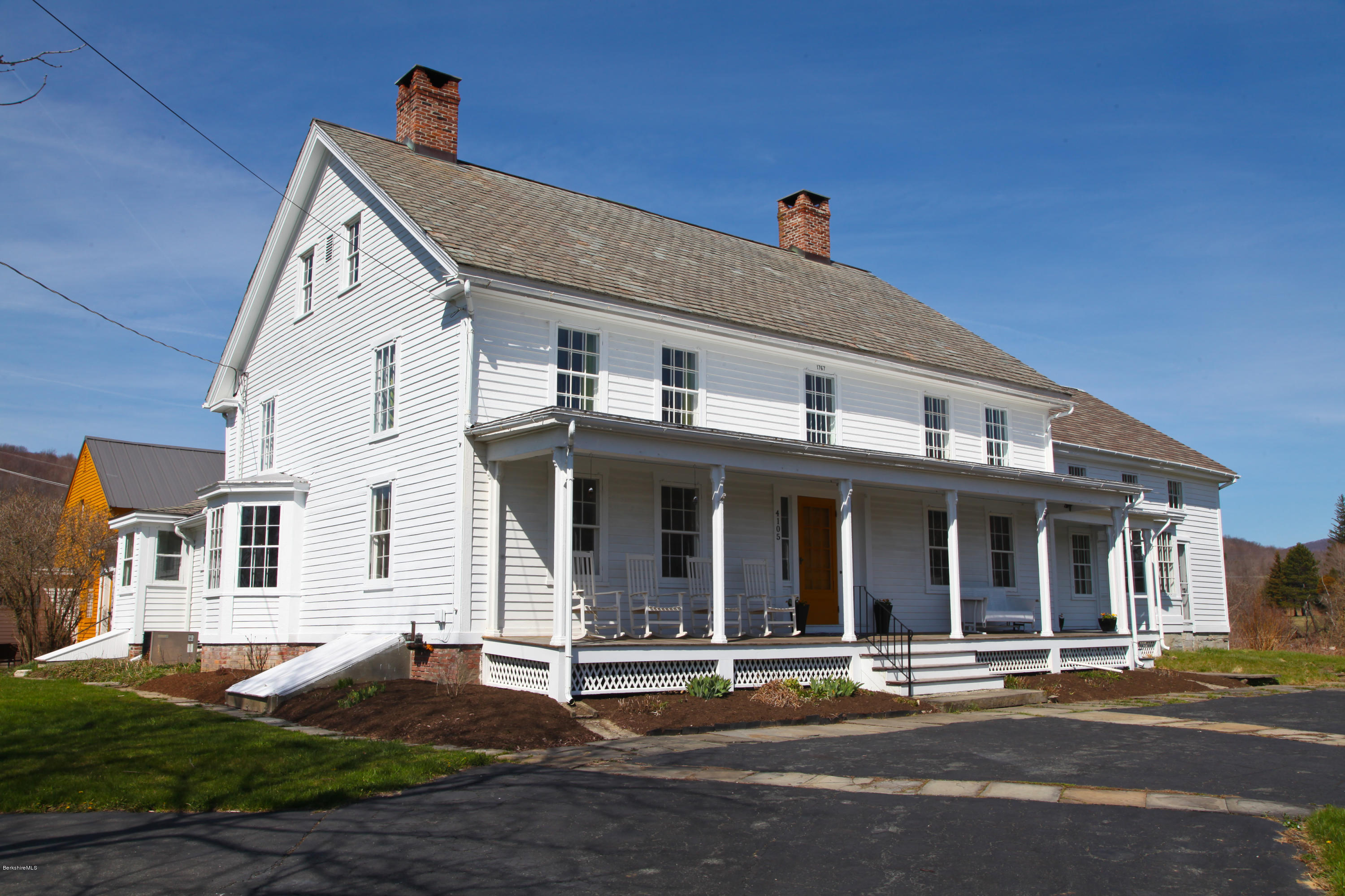 4105 Hancock Road Hancock, MA 01237 - Photo 1 of 57 a front view of a house with a yard