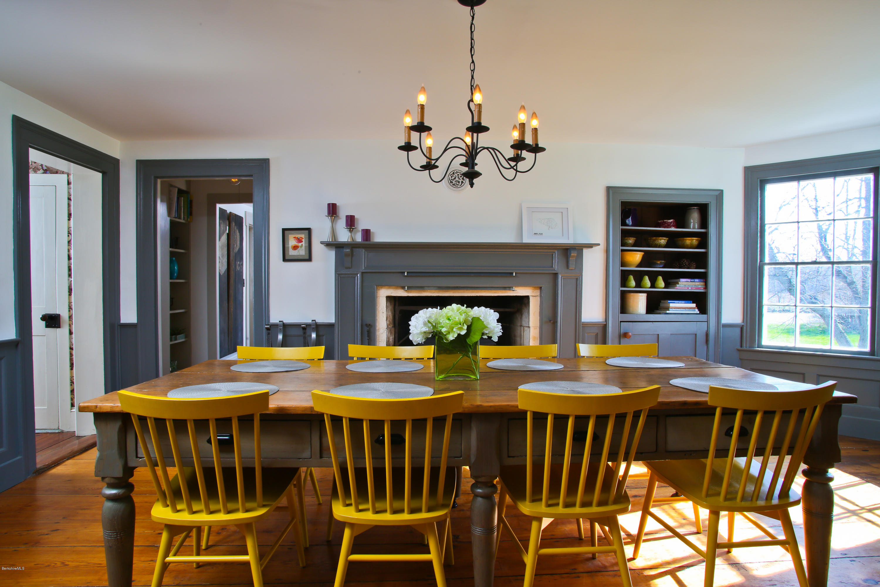 4105 Hancock Road Hancock, MA 01237 - Photo 11 of 57 a view of a dining room with furniture window and wooden floor