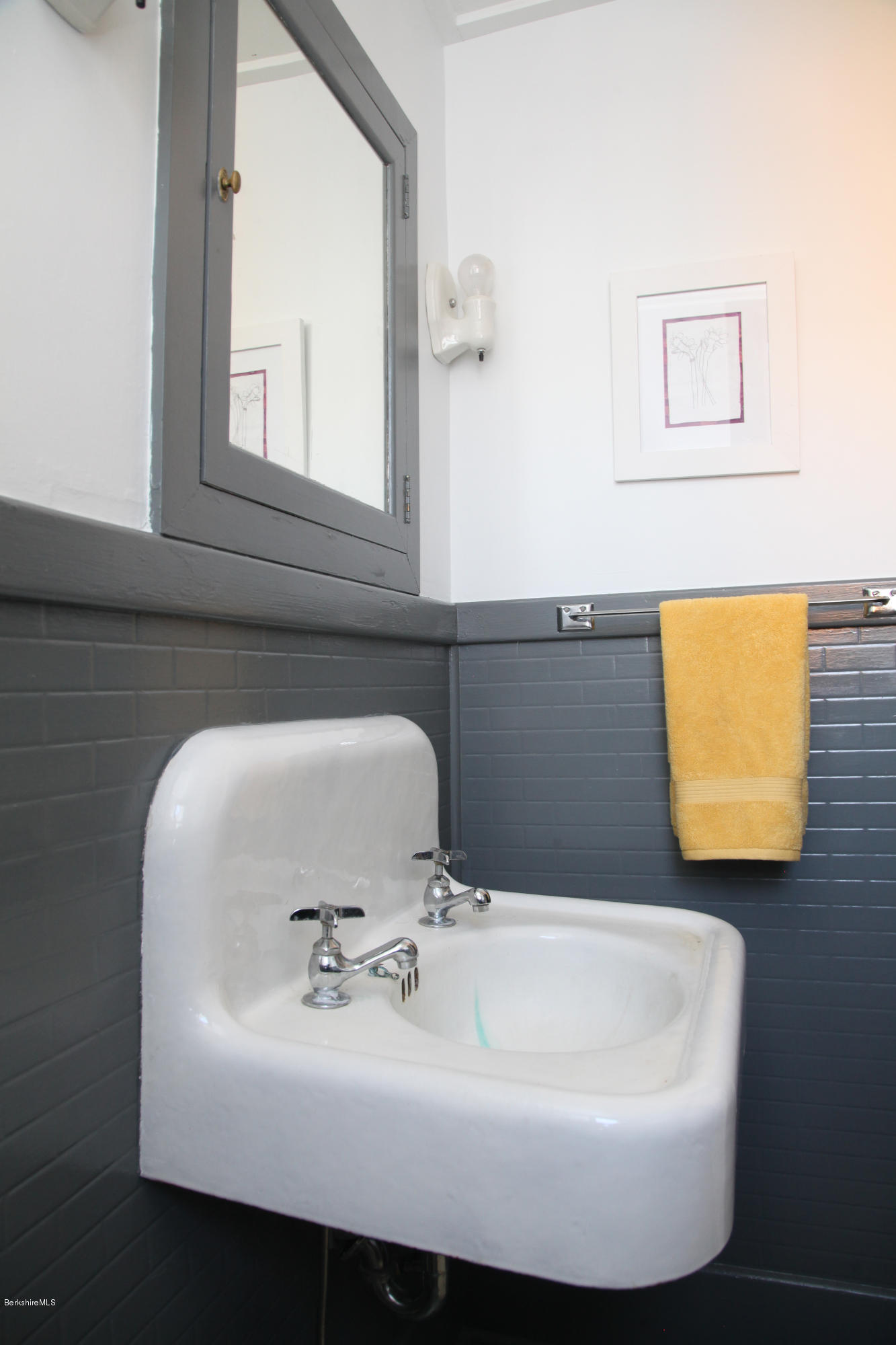 4105 Hancock Road Hancock, MA 01237 - Photo 20 of 57 a bathroom with a sink and a mirror