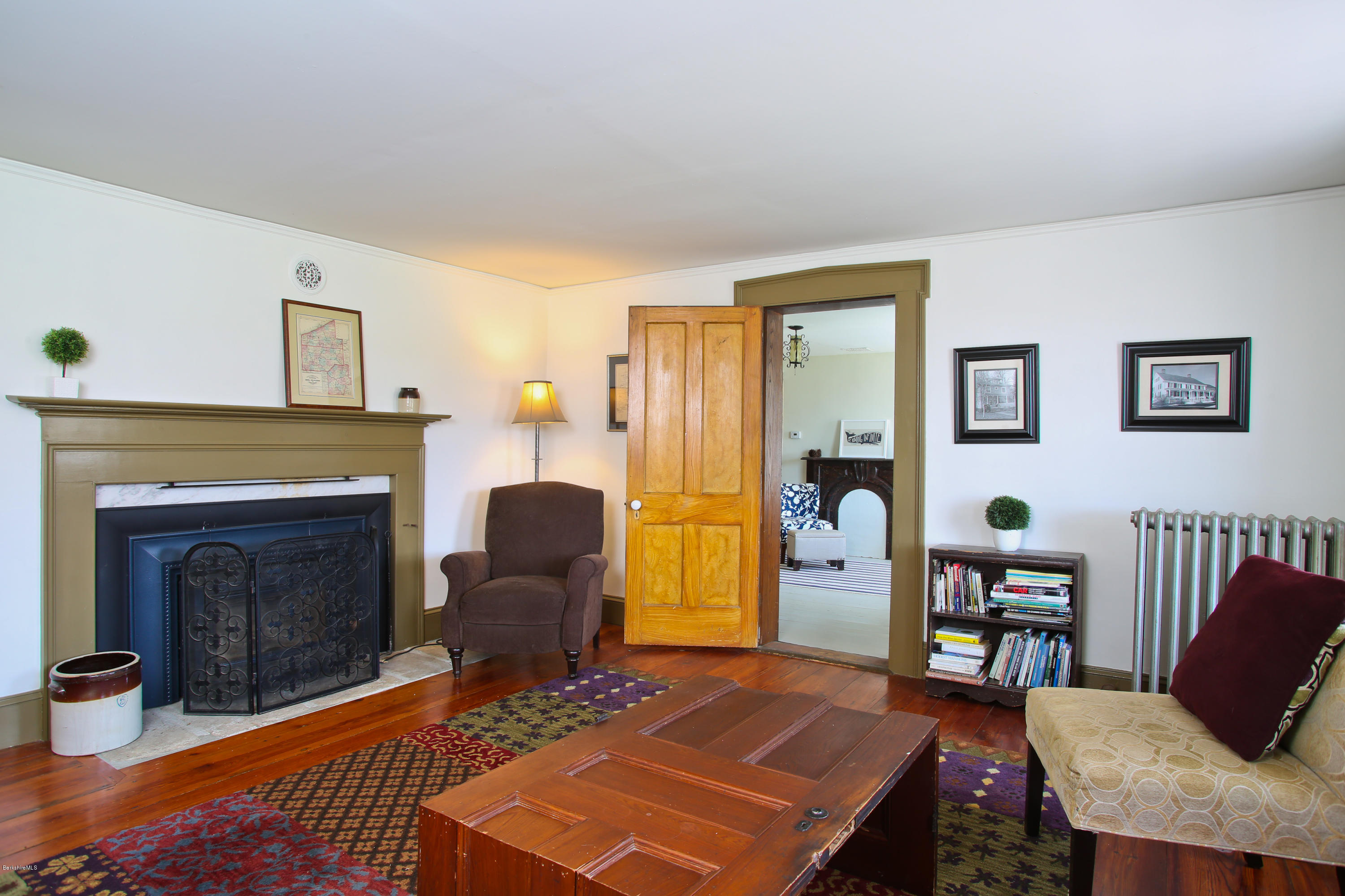 4105 Hancock Road Hancock, MA 01237 - Photo 24 of 57 a living room with furniture and a fireplace