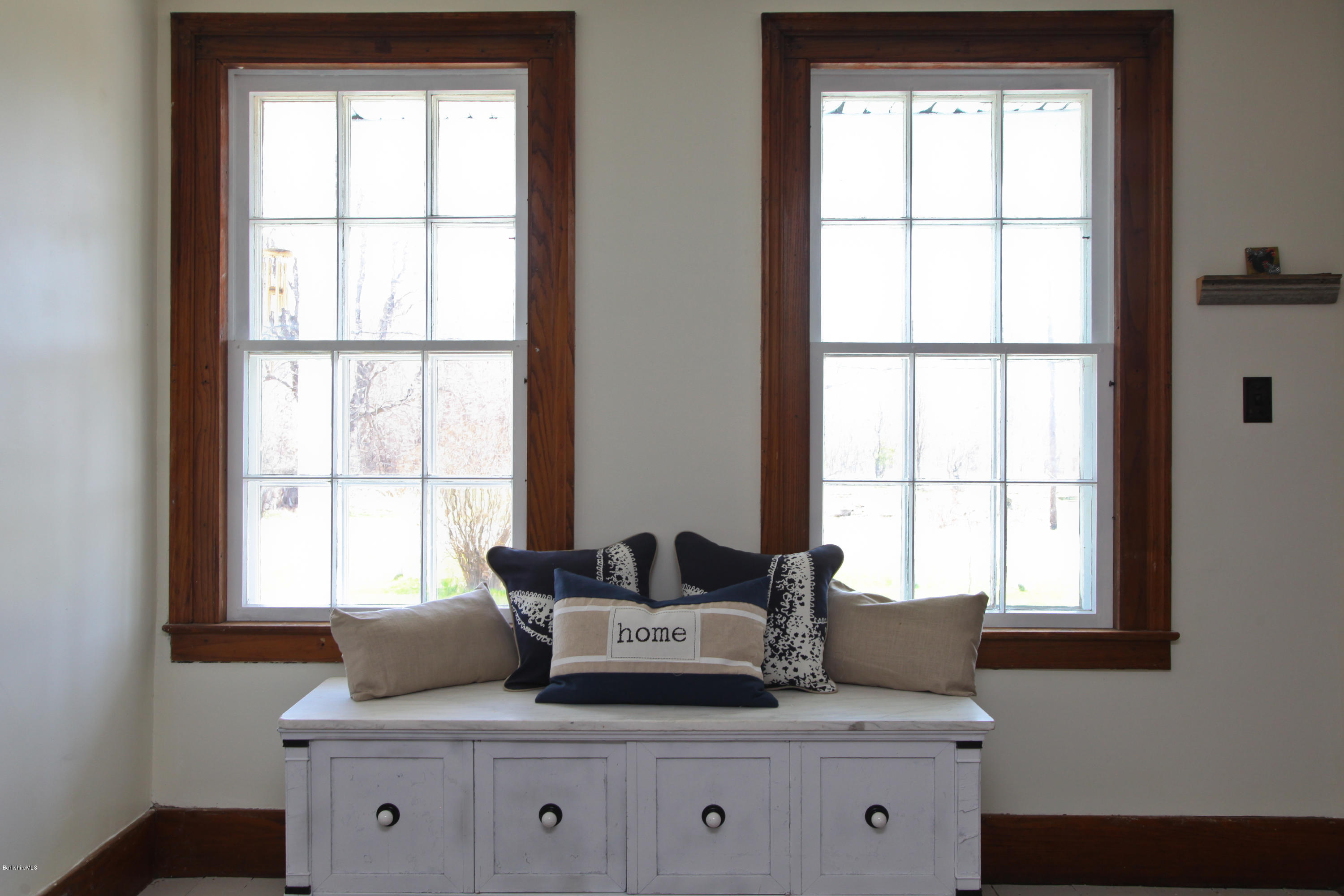 4105 Hancock Road Hancock, MA 01237 - Photo 26 of 57 a living room with furniture and large windows
