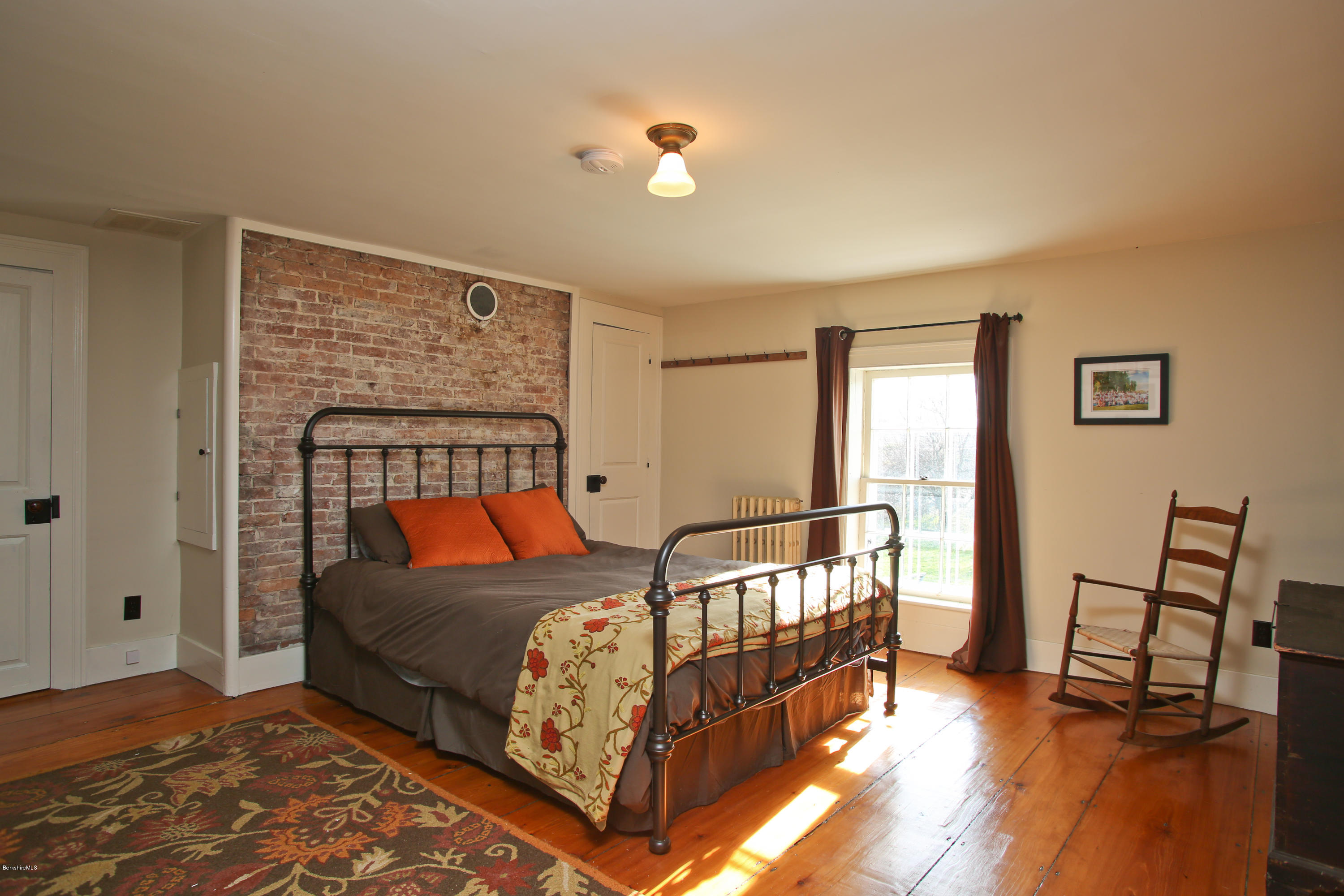 4105 Hancock Road Hancock, MA 01237 - Photo 40 of 57 a bedroom with a bed and a window