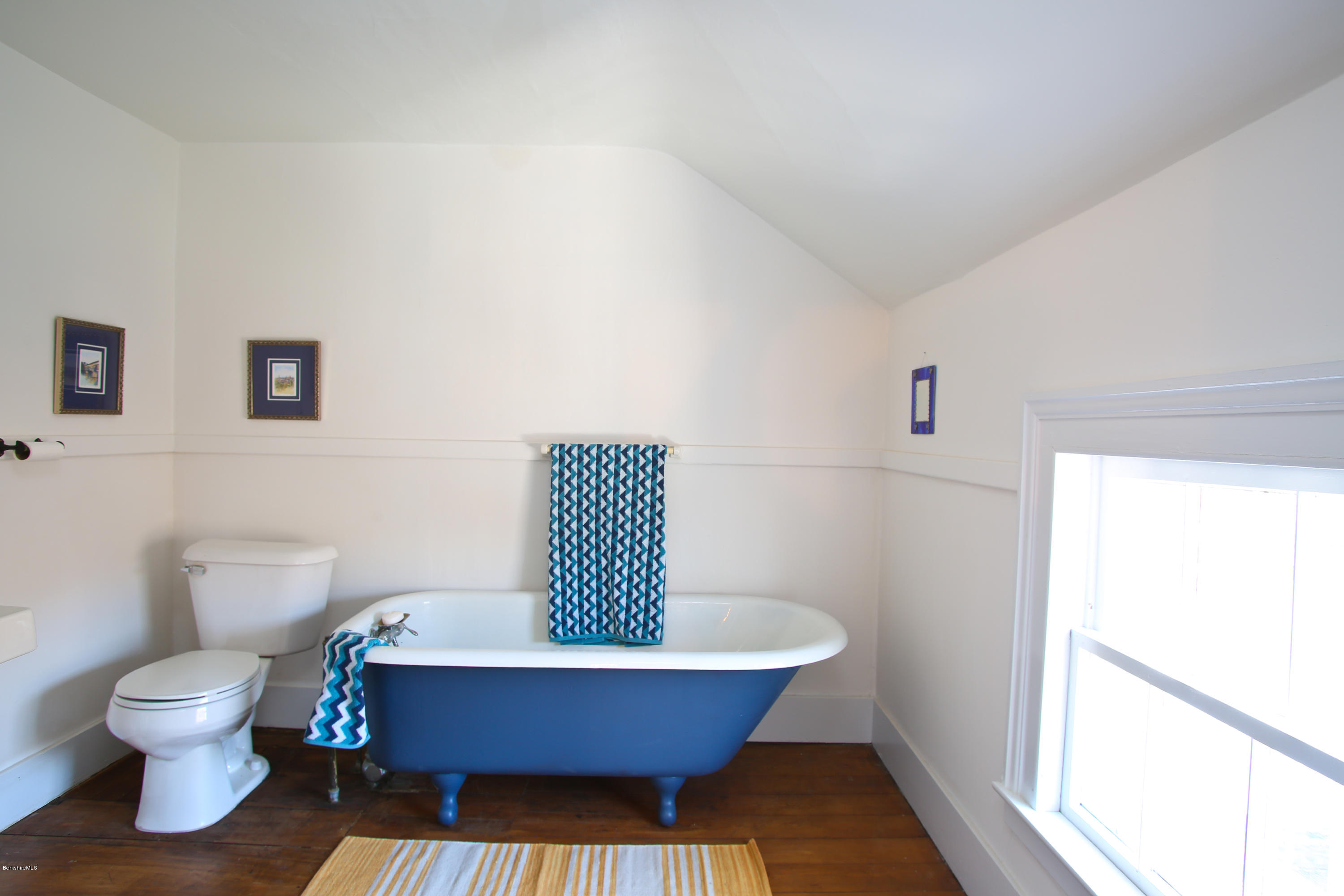 4105 Hancock Road Hancock, MA 01237 - Photo 50 of 57 a living room with a toilet and a sink