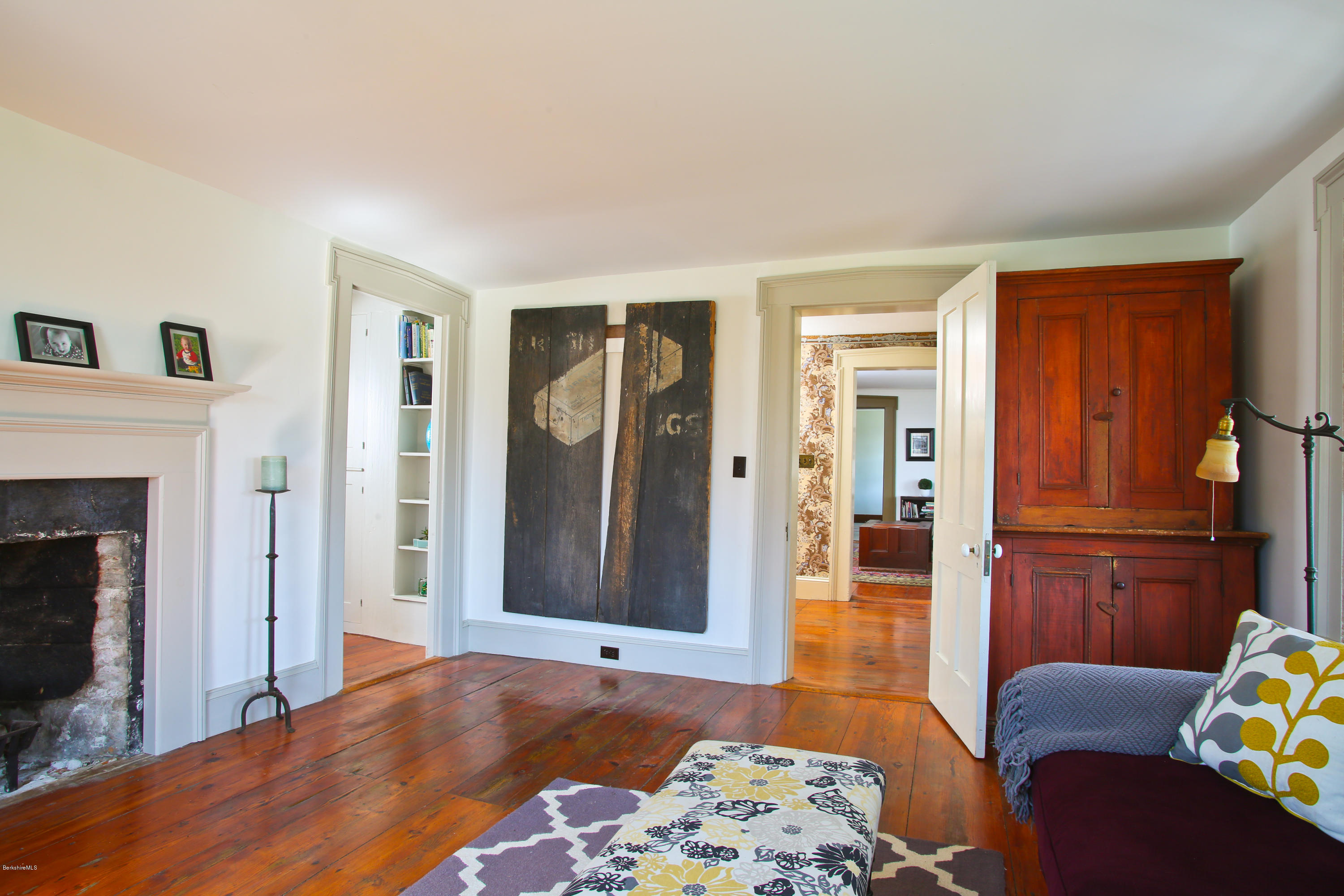 4105 Hancock Road Hancock, MA 01237 - Photo 9 of 57 a bedroom with furniture and a fireplace