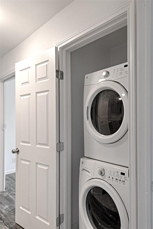 8545 Midpark Road, Unit 2 Dallas, TX 75240 - Photo 12 of 19 a view of a hallway with washer and dryer