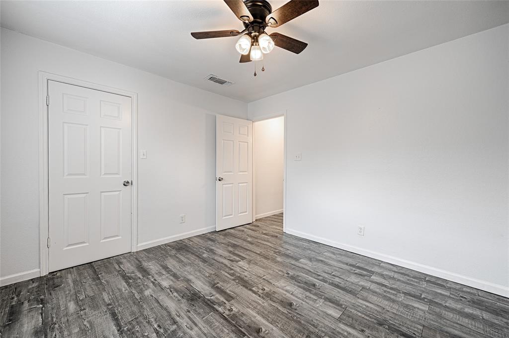 8545 Midpark Road, Unit 2 Dallas, TX 75240 - Photo 16 of 19 wooden floor in an empty room