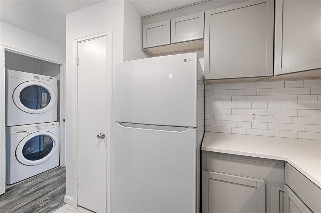 8545 Midpark Road, Unit 2 Dallas, TX 75240 - Photo 7 of 19 a white refrigerator freezer sitting inside of a kitchen