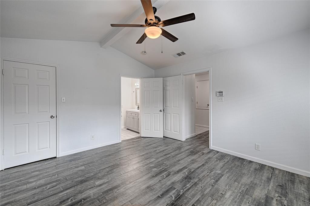 8545 Midpark Road, Unit 2 Dallas, TX 75240 - Photo 9 of 19 wooden floor in an empty room