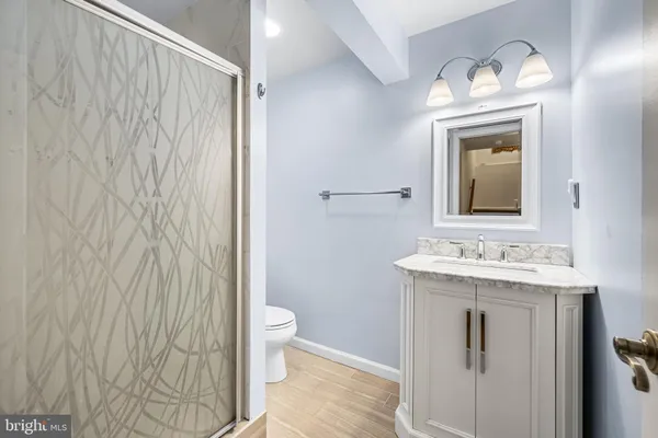 a view of balcony with wooden floor and outdoor seating