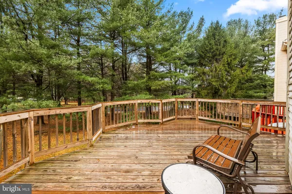 a view of a balcony with chairs