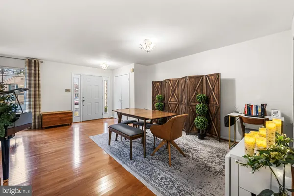 a bathroom with a sink toilet and mirror
