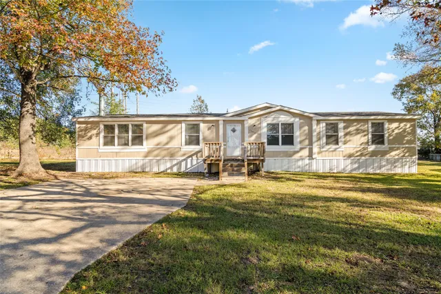 a view of a house with a swimming pool