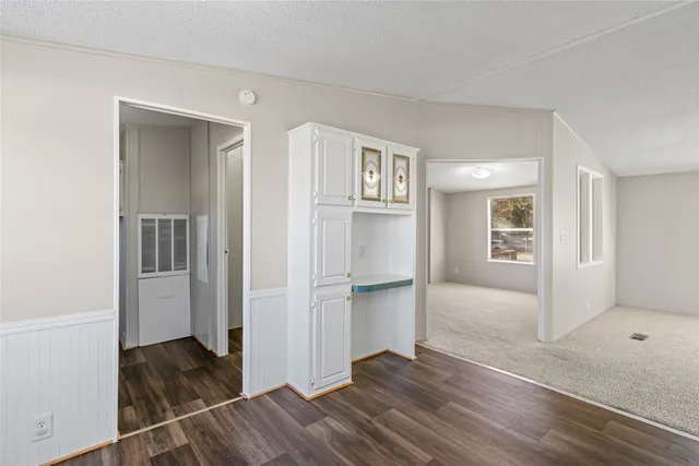 a view of a room with racks on the wall