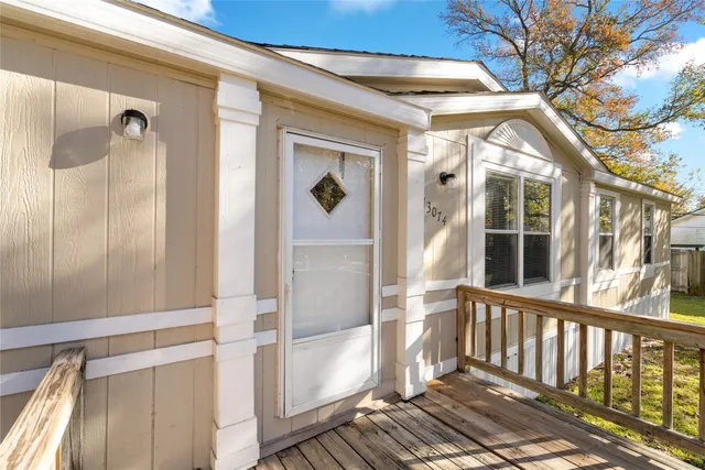 a view of a house with a glass door