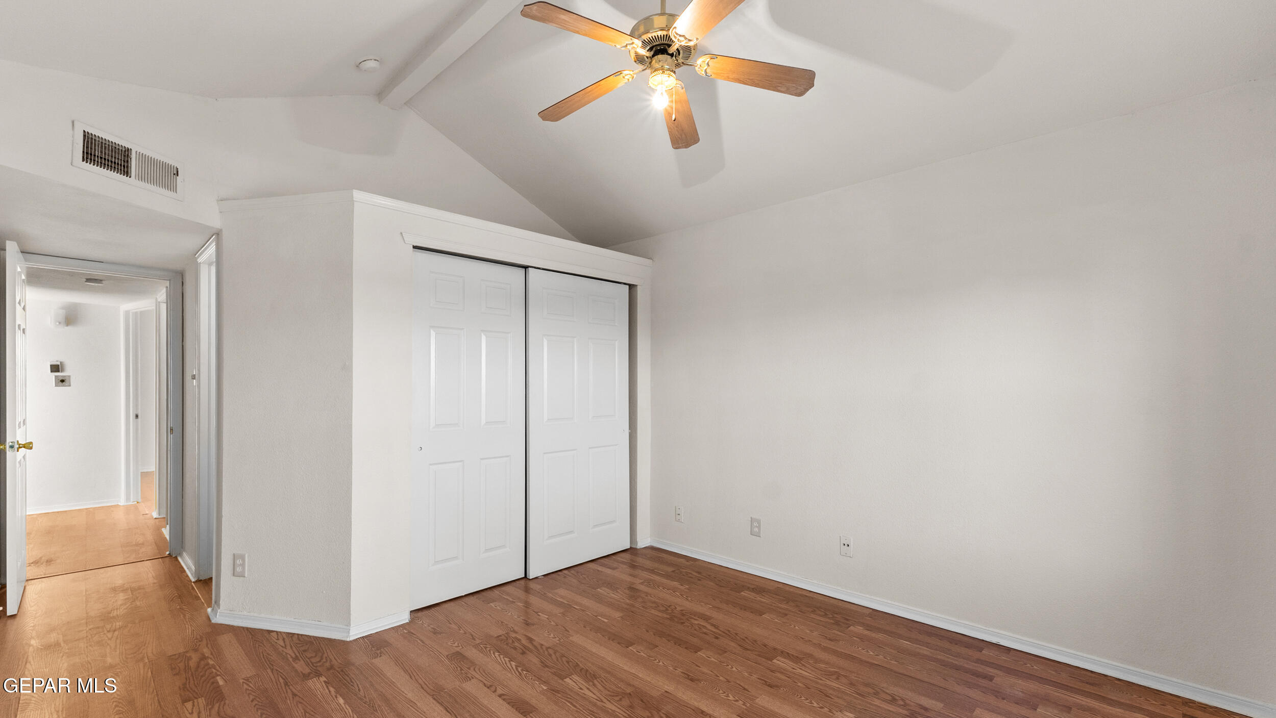 1729 St Mark Avenue El Paso, TX 79936 - Photo 19 of 31 a view of an empty room with wooden floor