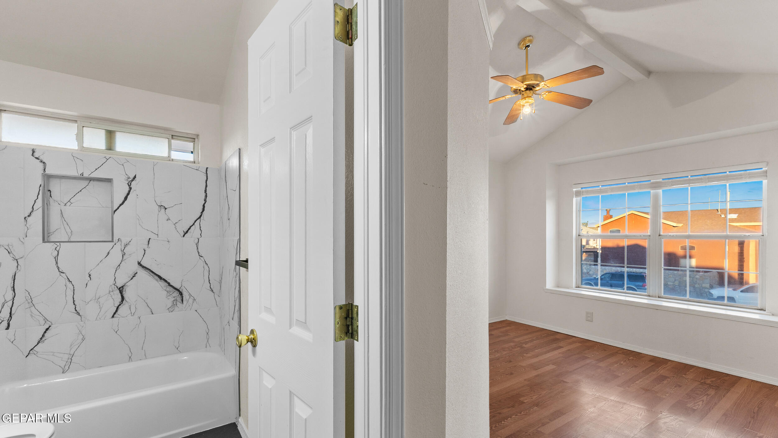 1729 St Mark Avenue El Paso, TX 79936 - Photo 20 of 31 a view of a bathroom with a tub and shower