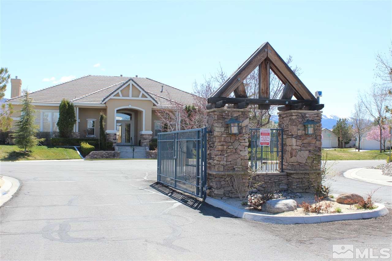 10409 Summershade Lane Reno, NV 89521 - Photo 21 of 22 a front view of a house with a yard and fountain