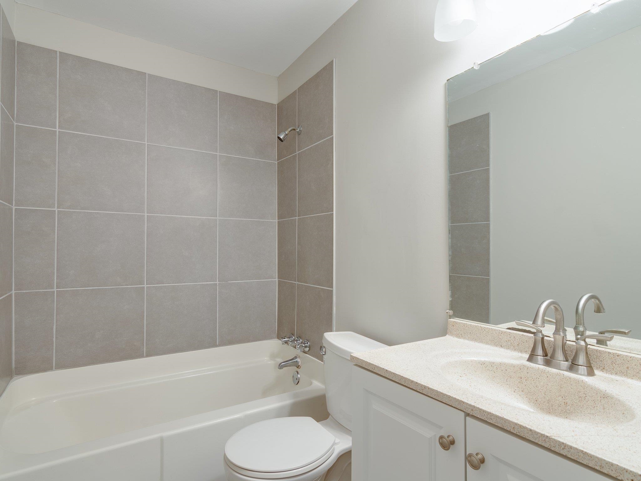 450 Homeville Road Collierville, TN 38017 - Photo 10 of 17 Full bathroom with vanity and bathing tub / shower combination