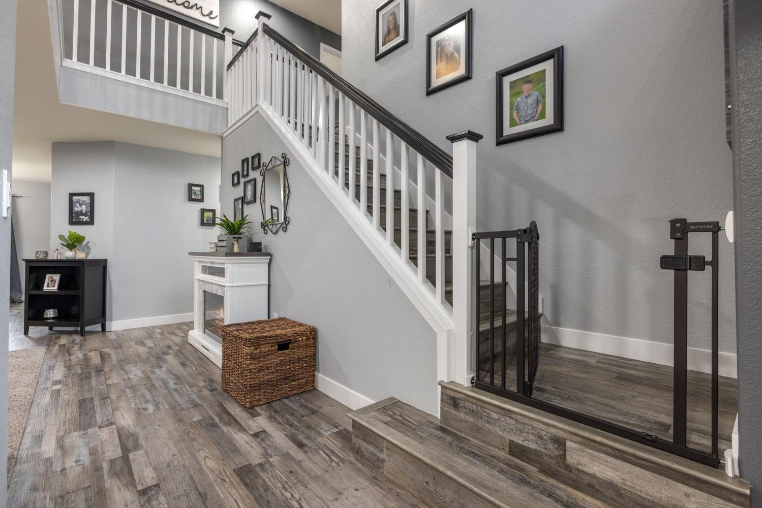 818 Travaille Way Ripon, CA 95366 - Photo 27 of 52 a view of entryway and hall with wooden floor