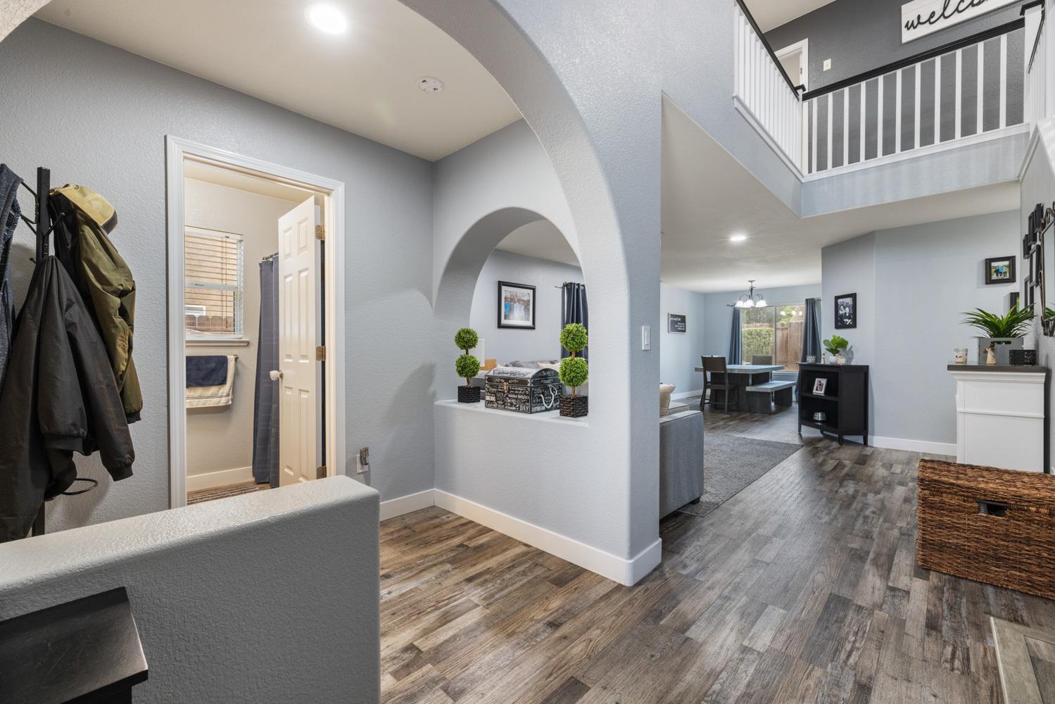 818 Travaille Way Ripon, CA 95366 - Photo 6 of 52 a view of a living room and a wooden floor