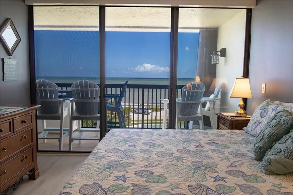 a bathroom with a tub and shower