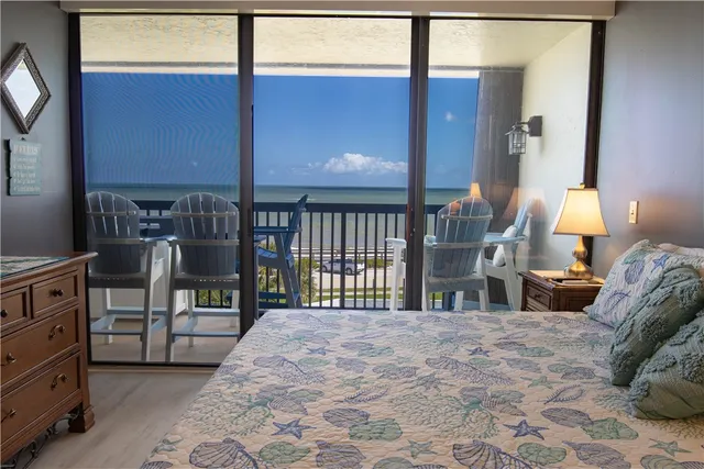 a bathroom with a tub and shower