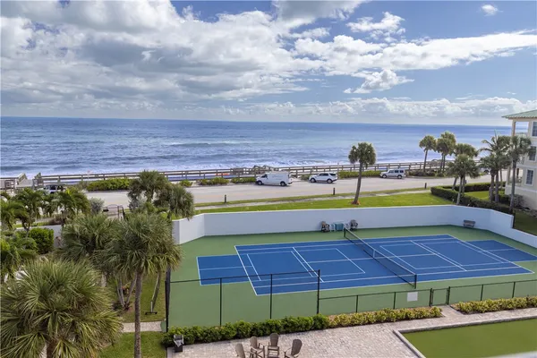 a view of swimming pool with outdoor space and seating area