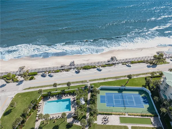 a hallway with a view of living room
