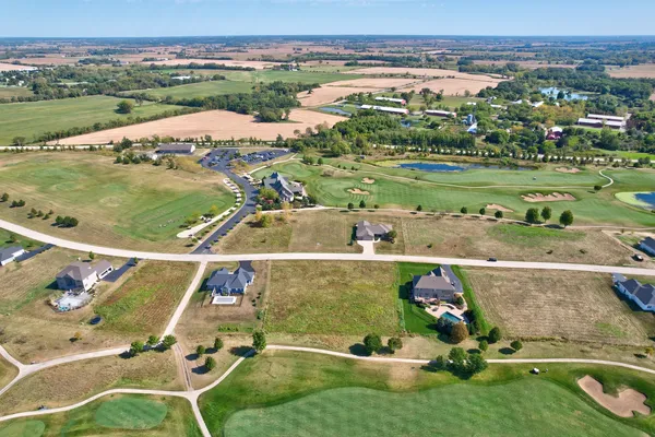 an aerial view of a house with a garden
