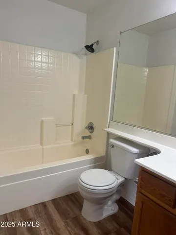 a bathroom with a toilet a sink and a bathtub