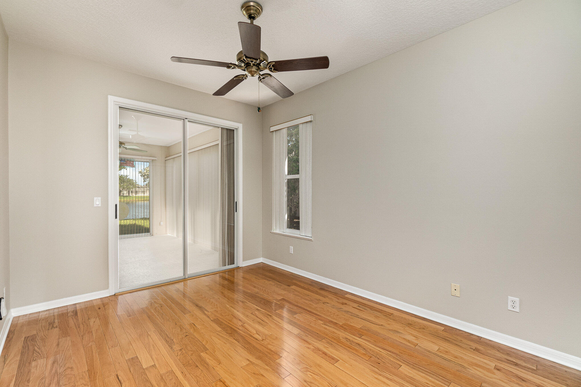 4370 Aberdeen Circle Rockledge, FL 32955 - Photo 17 of 33 a view of empty room with wooden floor