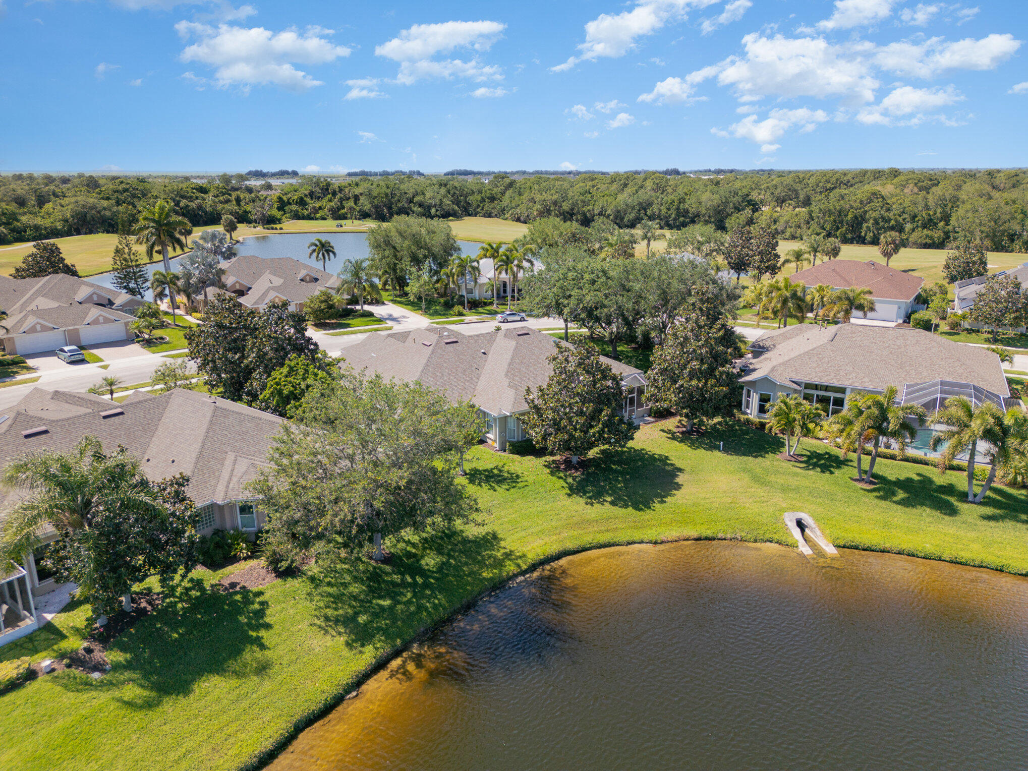 4370 Aberdeen Circle Rockledge, FL 32955 - Photo 24 of 33 aerial view of a house with a yard and lake view