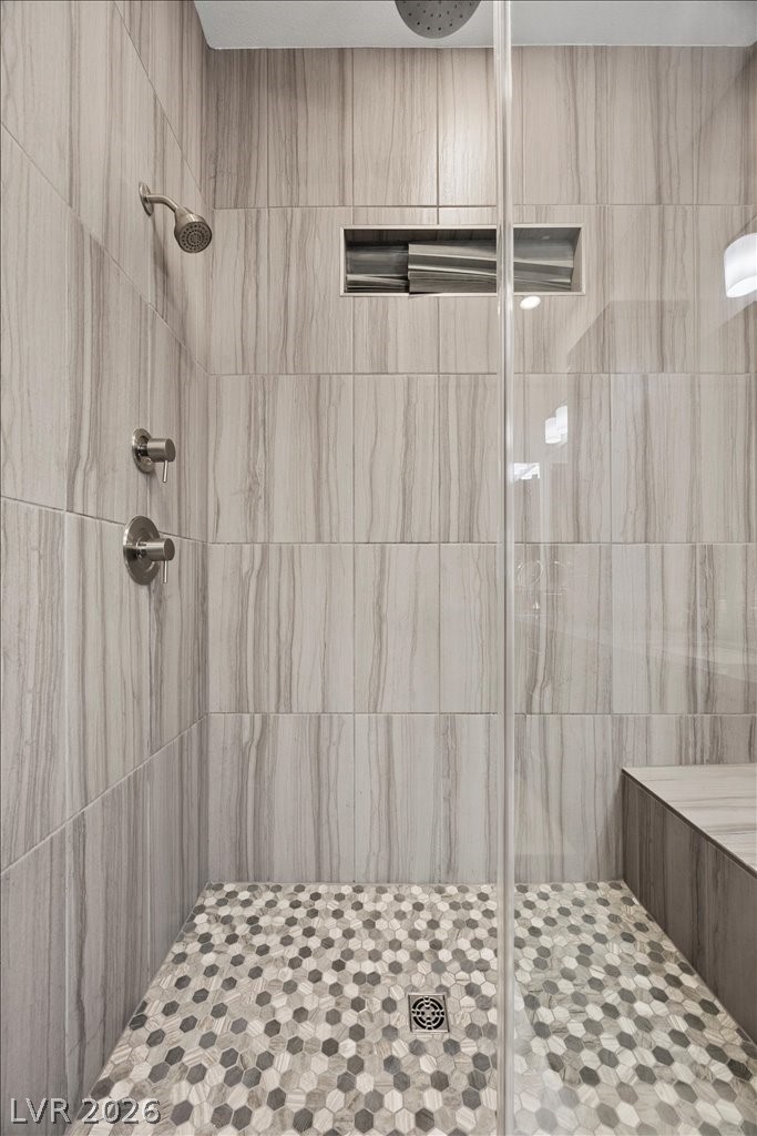 4262 Swift Street Las Vegas, NV 89135 - Photo 32 of 75 Full bath featuring a tile shower