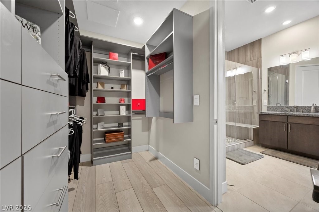 4262 Swift Street Las Vegas, NV 89135 - Photo 34 of 75 Walk in closet with light wood finished floors