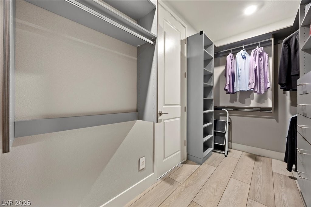 4262 Swift Street Las Vegas, NV 89135 - Photo 35 of 75 Spacious closet featuring light wood-type flooring