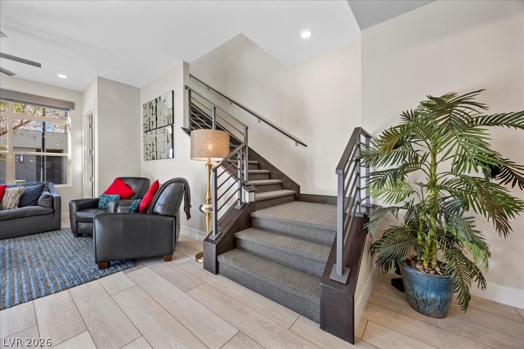 4262 Swift Street Las Vegas, NV 89135 - Photo 39 of 75 Stairway with wood finished floors and recessed lighting