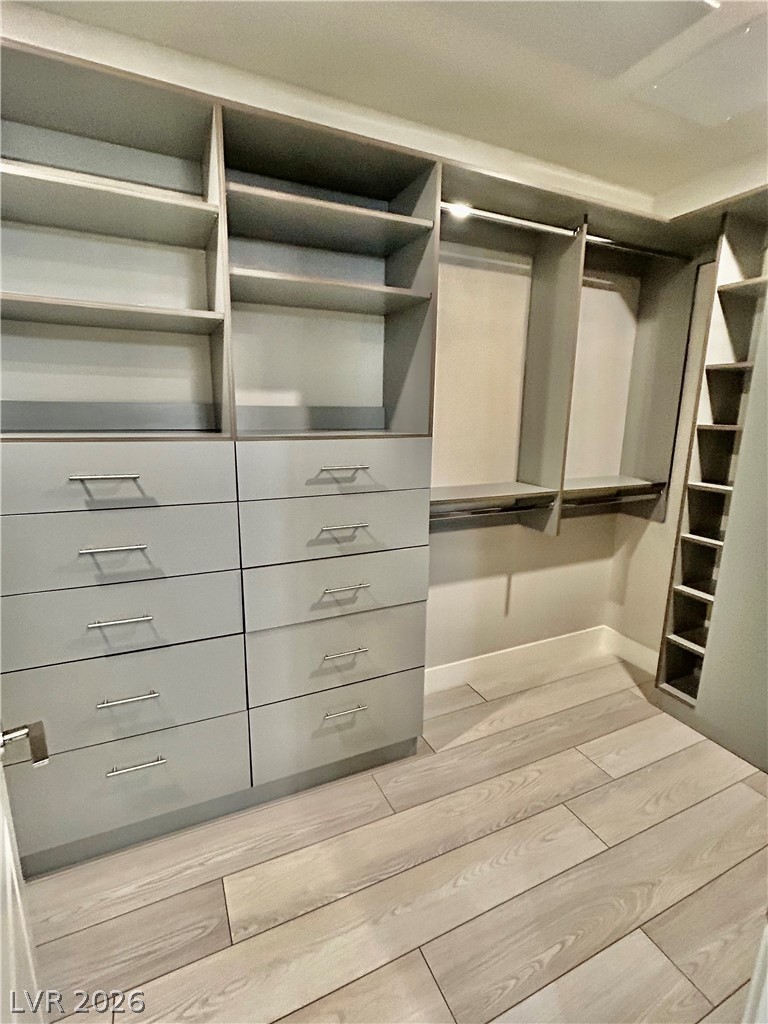 4262 Swift Street Las Vegas, NV 89135 - Photo 60 of 75 Walk in closet with wood finish floors