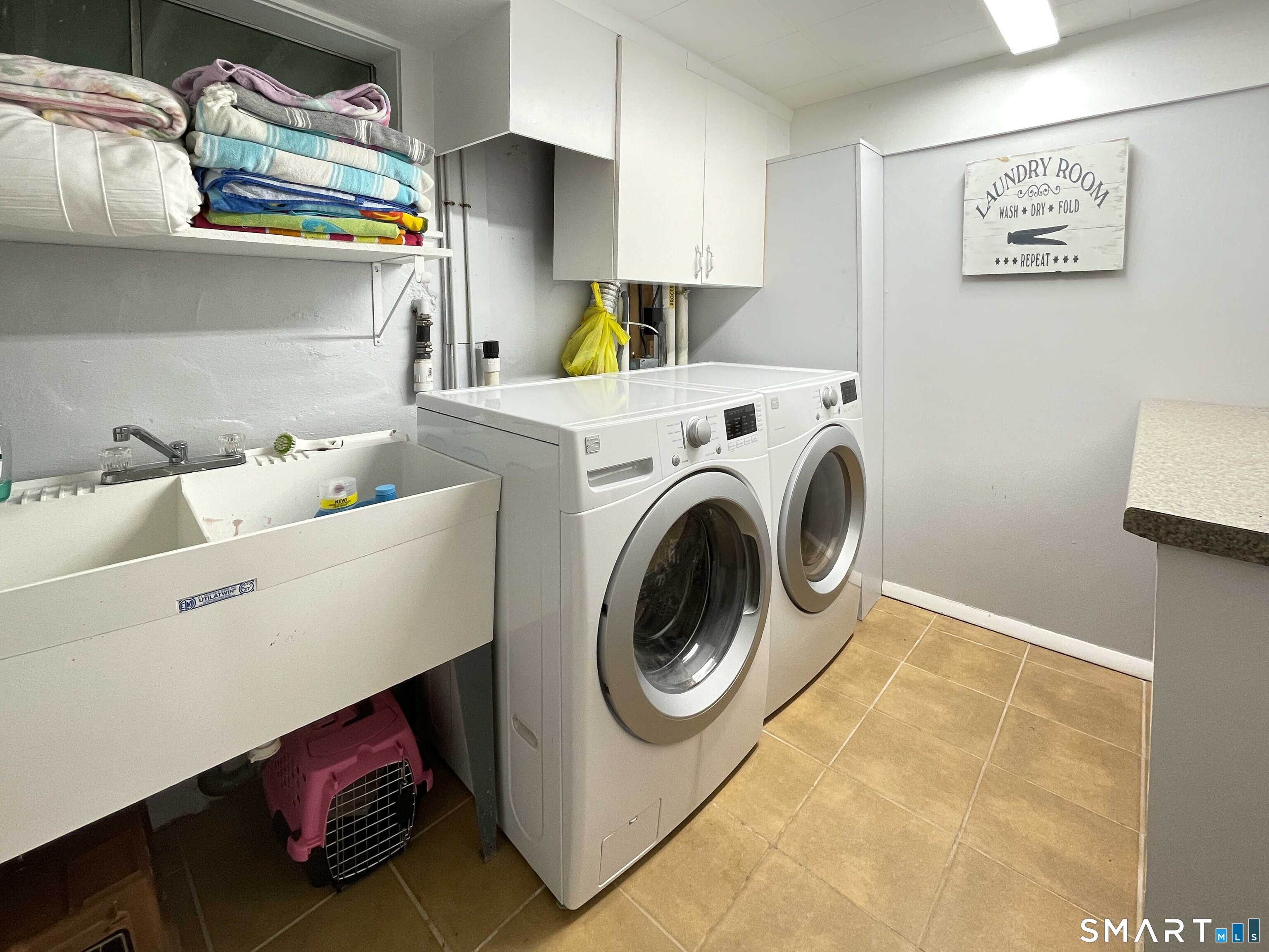 5 Sycamore Lane Brookfield, CT 06804 - Photo 22 of 25 Lower Level Laundry with Utility Sink; washer dryer included.